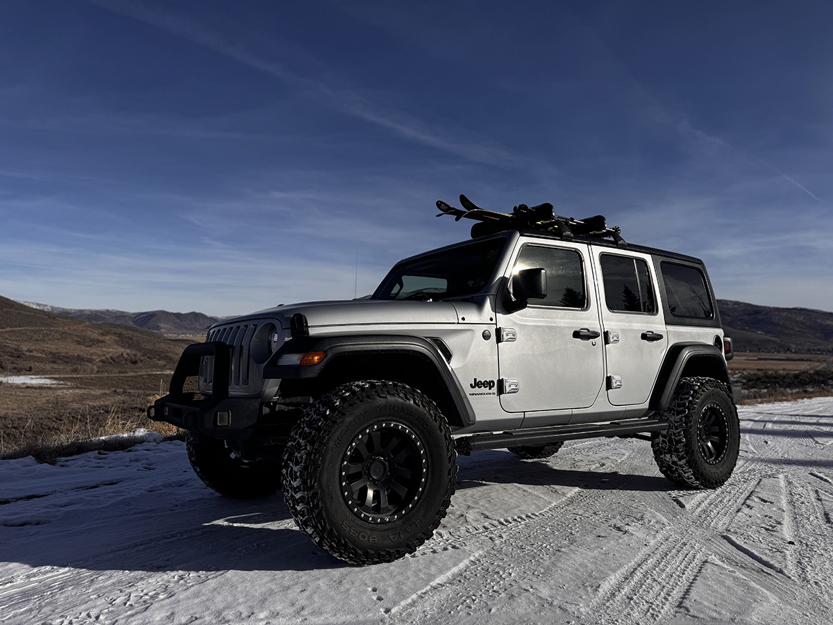 Silver Jeep in the snow